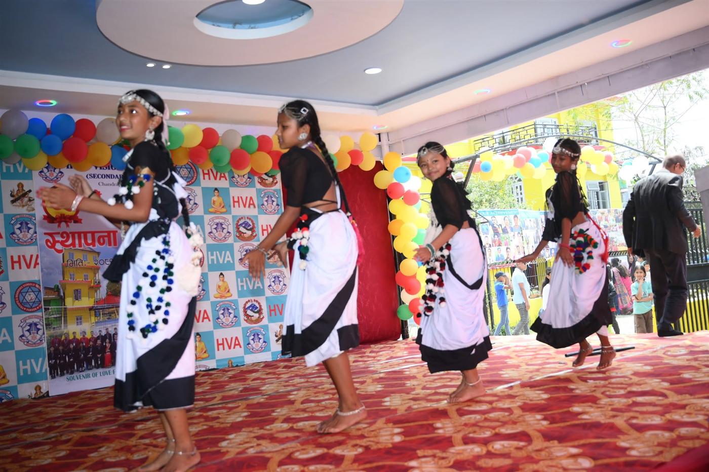 Students performing a traditional dance