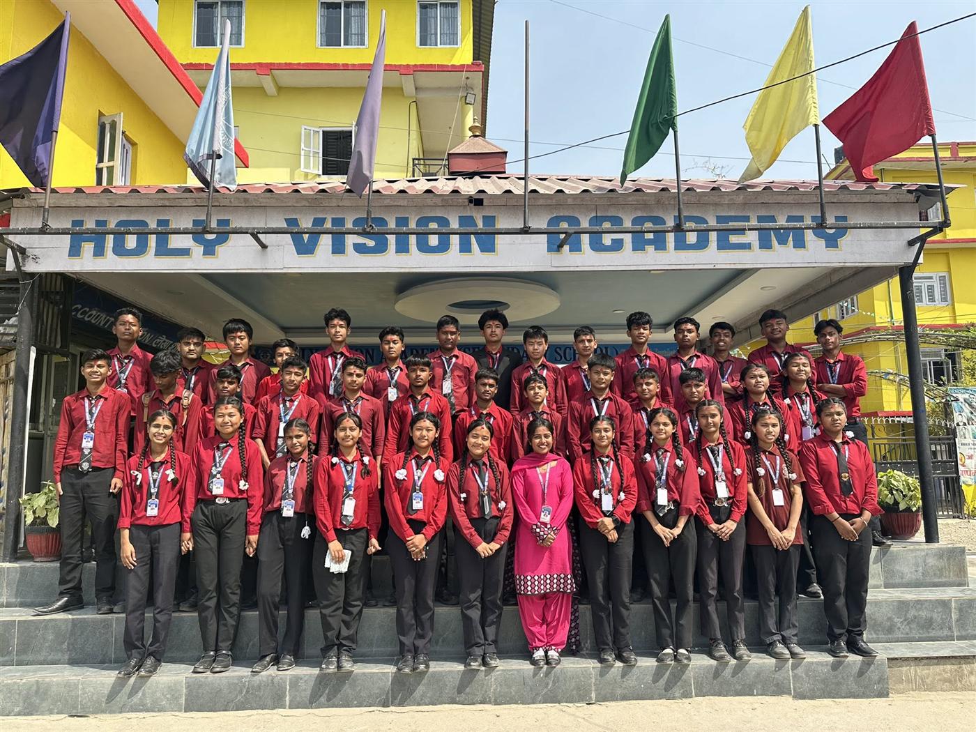 Holy Vision students celebrating their achievements